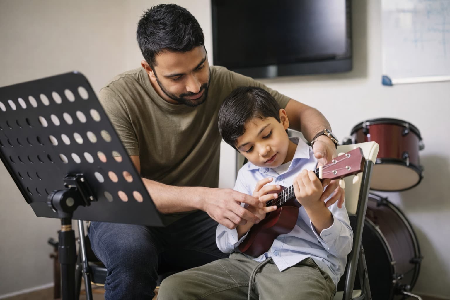 Teacher and student with ukulele