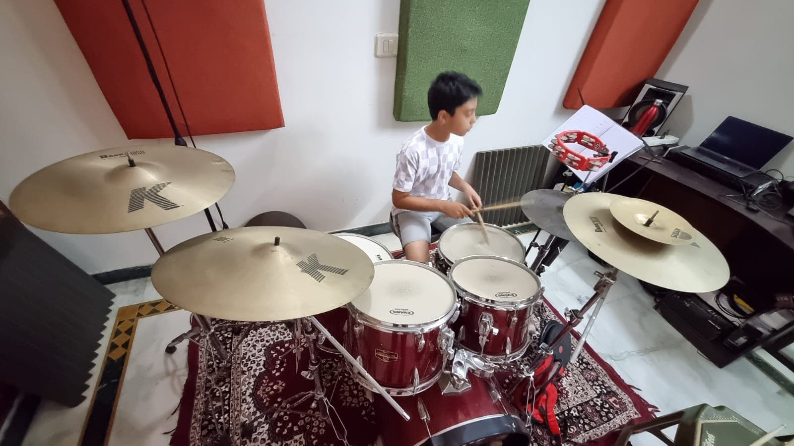 Student practicing drums