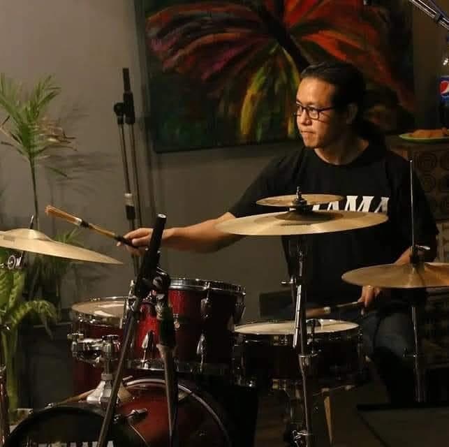 Nawin Rai playing drums